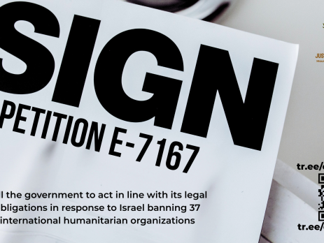 Photo of a piece of paper on a title with bold black title: SIGN PETITION E-7167. Tell the government to act in line with its legal obligations in response to Israel banning 37 international humanitarian organizations